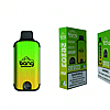 A disposable vape device and packaging with a green and yellow gradient design, branded "bang." The packaging highlights features like "Dual Mesh," "2 Puffs," and includes a nicotine warning label.