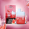 Red and white disposable vape device labeled "Bang BC5000 Watermelon Ice" next to its packaging, featuring 5000 puffs, 650mAh, 13ml e-liquid, and watermelon slices.