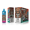 A disposable vape device and packaging featuring a "Tattoo Convention" design with a detailed skull wearing a samurai helmet, labeled "Blueberry Ice" flavor and "Bang Tornado" branding.
