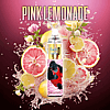 A vape pen labeled "PINK LEMONADE" with a graphic of a muscular gorilla wearing a red tank top, set against a vibrant background of pink and yellow lemon slices, pink flowers, and splashing liquid.