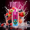 Vape pen with colorful design in front of splashing mixed berries and "VIMTO" text background.